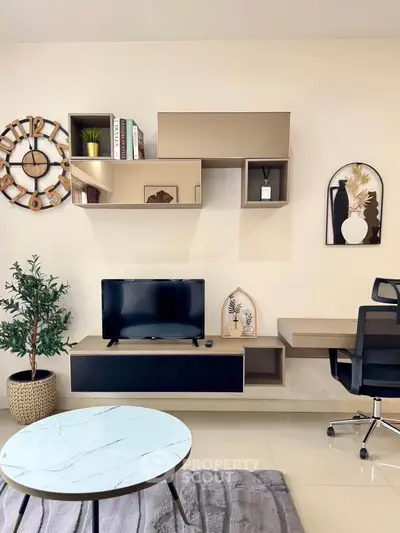 Modern living room with stylish decor and wall-mounted shelves