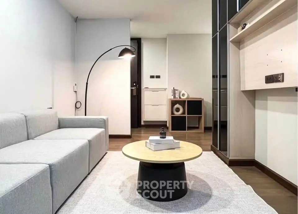 Modern living room with sleek furniture and stylish decor, perfect for contemporary urban living.