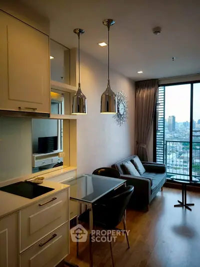 Modern living room with city view, stylish decor, and cozy seating area.