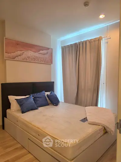 Cozy bedroom with modern decor and natural light
