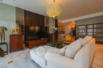 Luxurious living room with elegant decor and spacious seating area