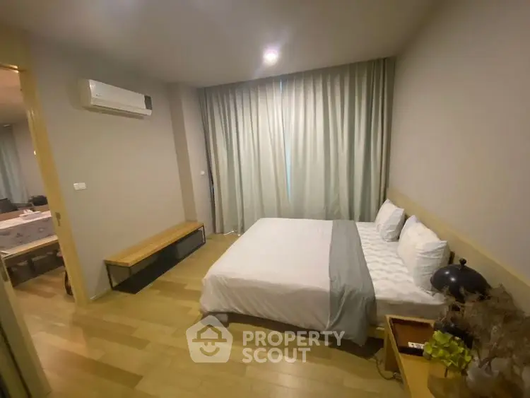 Cozy bedroom with modern decor and natural light