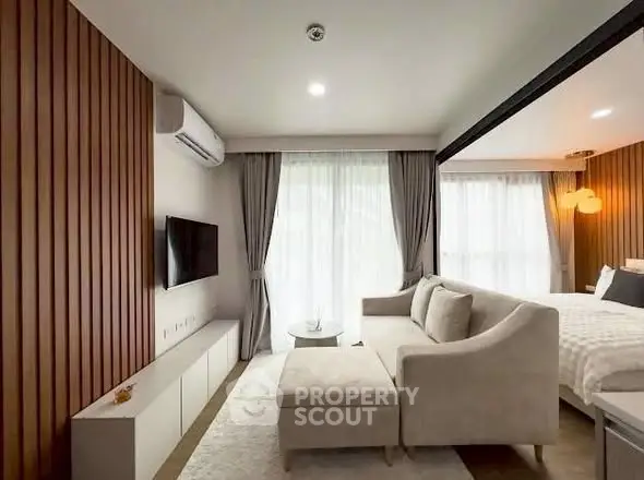 Modern living room with cozy sofa and stylish decor