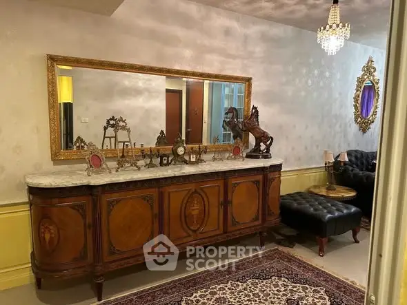 Luxurious living room with elegant antique furniture and ornate decor