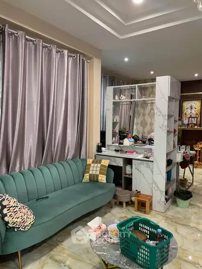 Stylish living room with modern sofa and marble accents