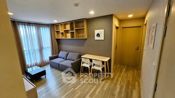 Modern living room with wooden flooring and stylish furniture