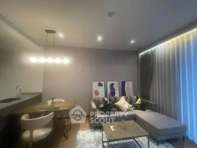 Modern living room with stylish decor and cozy seating area, perfect for relaxation and entertainment.