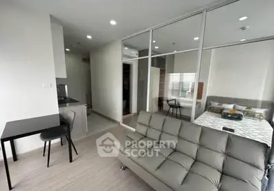 Modern studio apartment with open layout and stylish furnishings