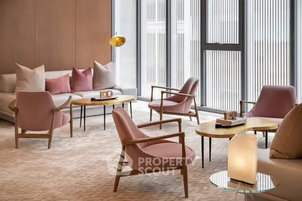 Elegant living room with modern furniture and large windows