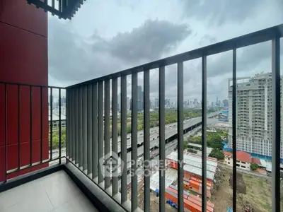 Spacious balcony with stunning cityscape view, perfect for urban living enthusiasts.