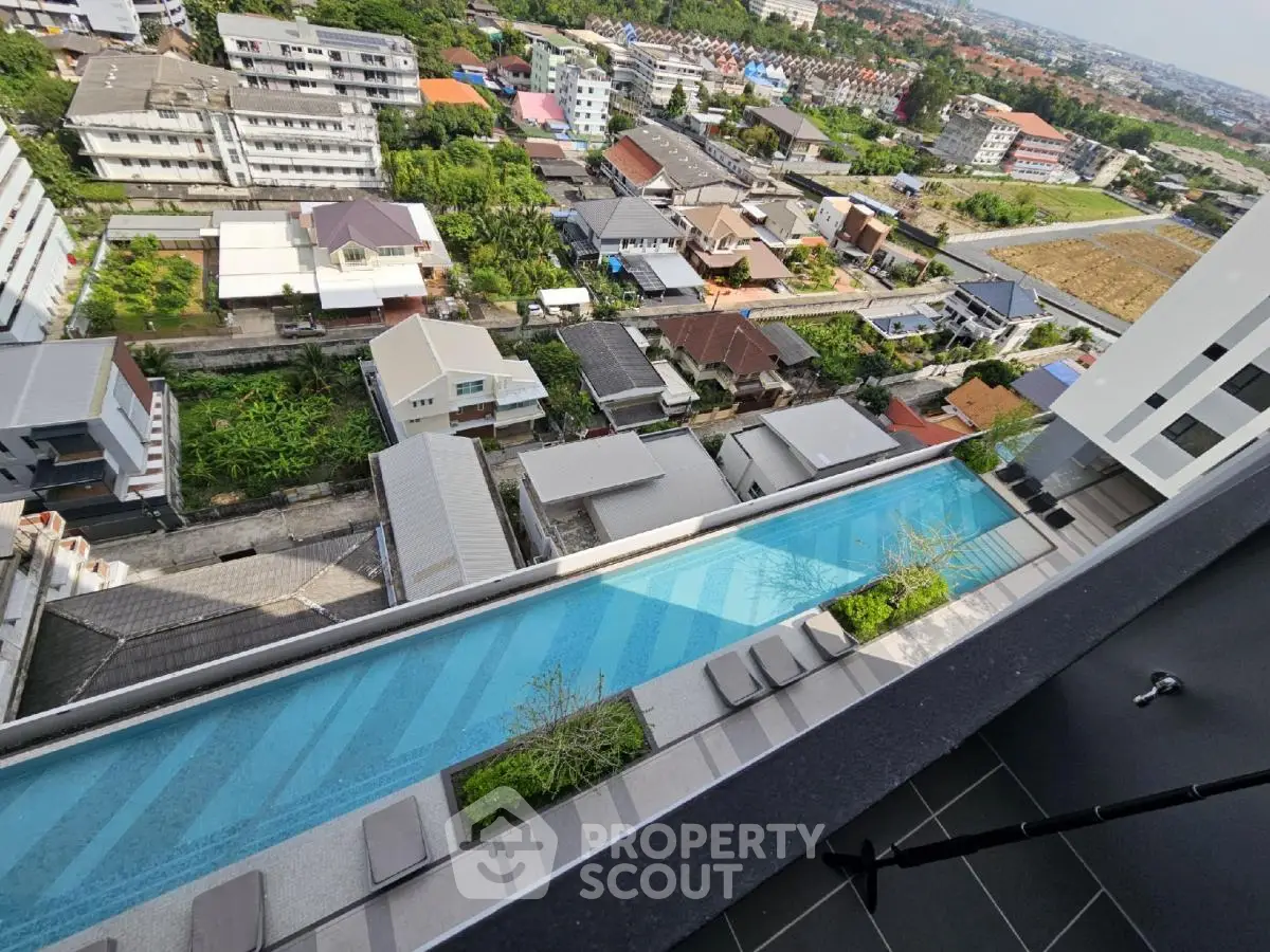 Stunning rooftop pool with panoramic city views in modern apartment complex