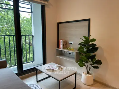 Modern living room with balcony view and stylish decor