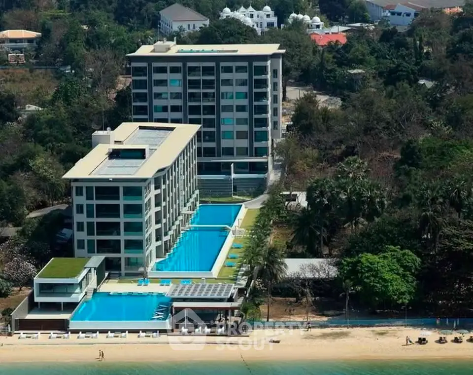 Luxurious beachfront condominium with stunning ocean views and infinity pool.