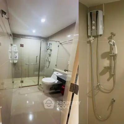 Modern bathroom with glass shower enclosure and sleek fixtures
