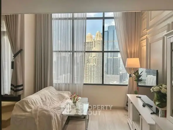 Luxurious living room with stunning city view, elegant decor, and natural light.