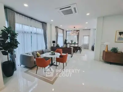 Spacious modern living room with elegant decor and ample natural light