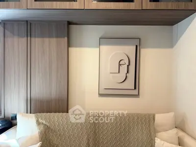 Modern living room with stylish wall art and cozy cushions