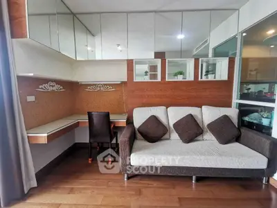 Modern living room with stylish sofa and built-in study desk