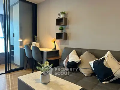 Modern living room with stylish decor and cozy seating area