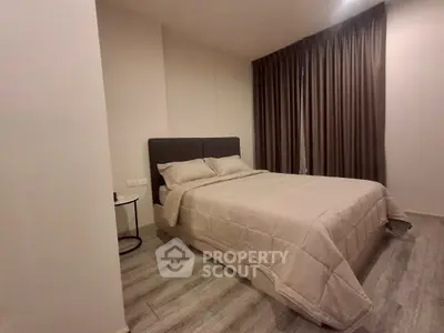 Cozy modern bedroom with elegant decor and soft lighting