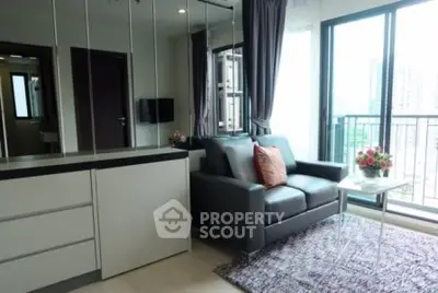 Modern living room with sleek sofa and city view balcony in urban apartment