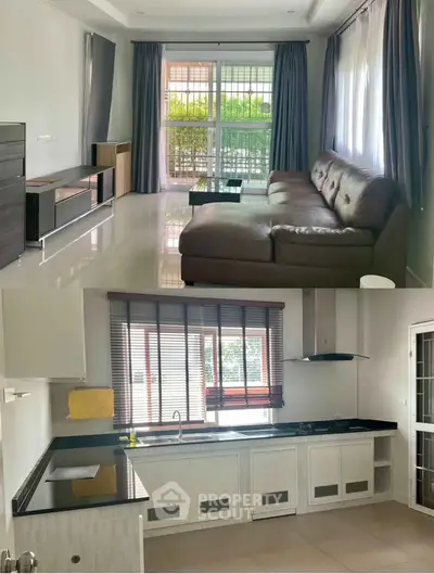 Spacious living room with modern kitchen in a bright, airy apartment.