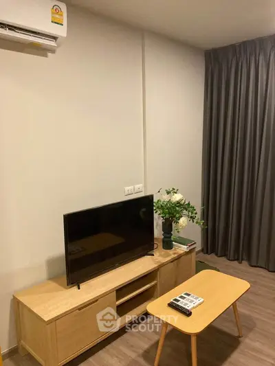 Modern living room with sleek TV stand and elegant decor