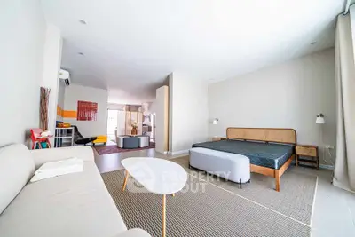 Spacious modern living room with stylish furniture and natural light