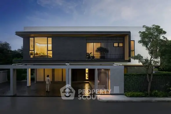 Luxurious modern home exterior with sleek design and ambient lighting