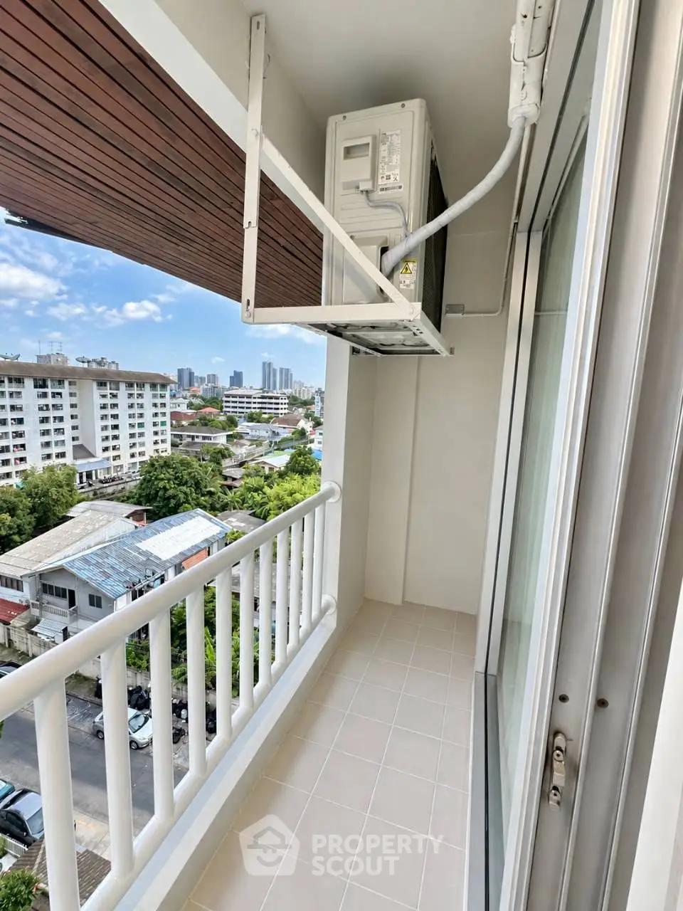Charming balcony with city view, perfect for relaxation and enjoying the skyline.