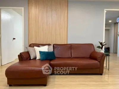 Stylish living room with modern leather sofa and elegant decor