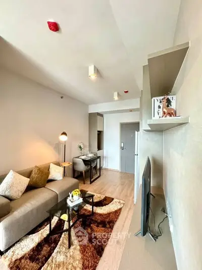 Modern living room with stylish decor and cozy seating area