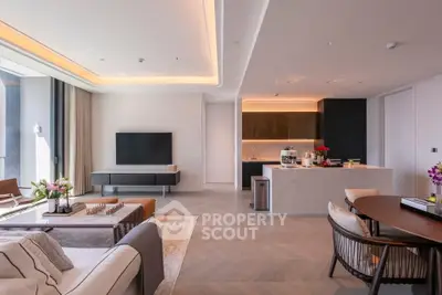 Luxurious modern living room with open kitchen and elegant decor