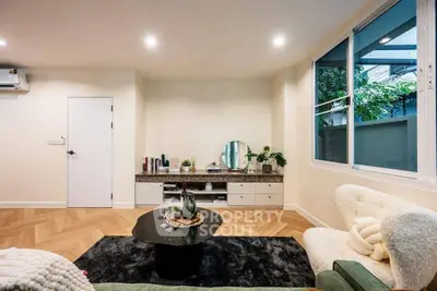 Stylish living room with modern decor and large window view