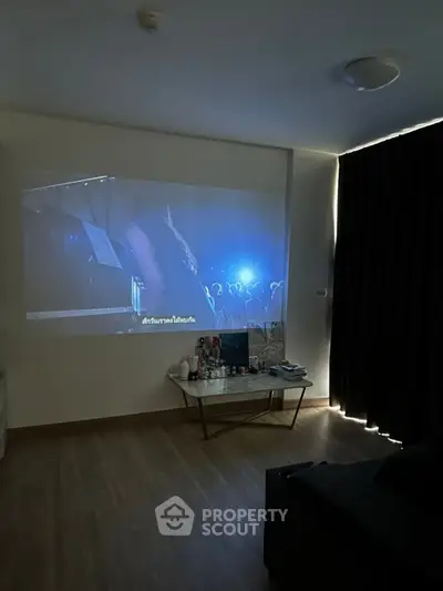 Cozy living room with home theater setup and modern decor