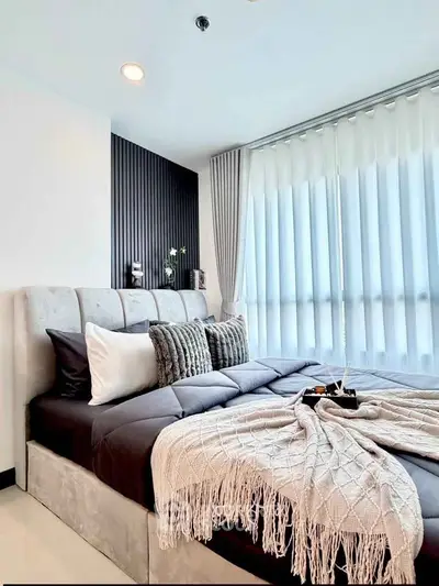 Luxurious modern bedroom with elegant decor and natural light