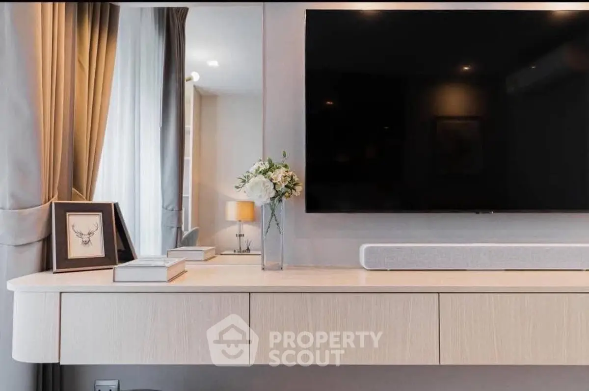 Modern living room with sleek TV setup and elegant decor