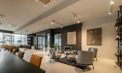 Modern living room with stylish furniture and open layout, perfect for entertaining.