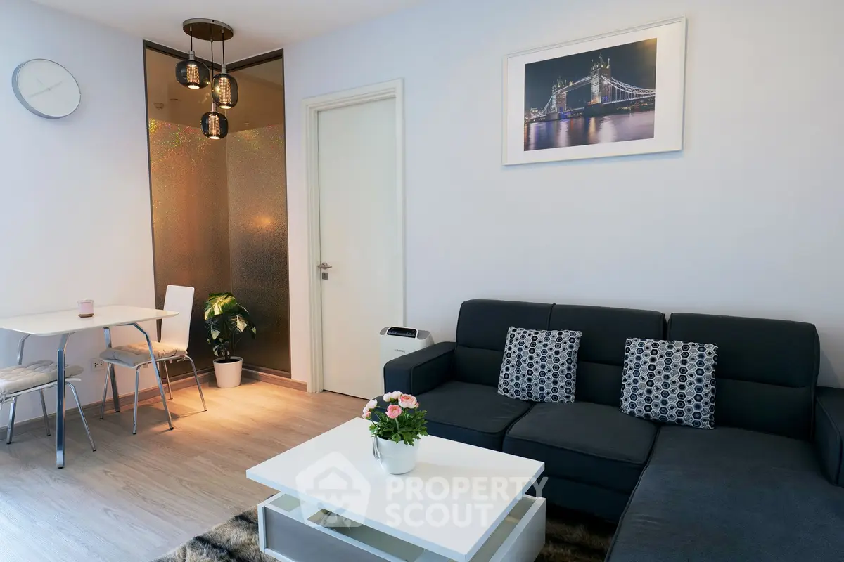 Modern living room with stylish decor and cozy seating area, perfect for relaxation and entertaining guests.