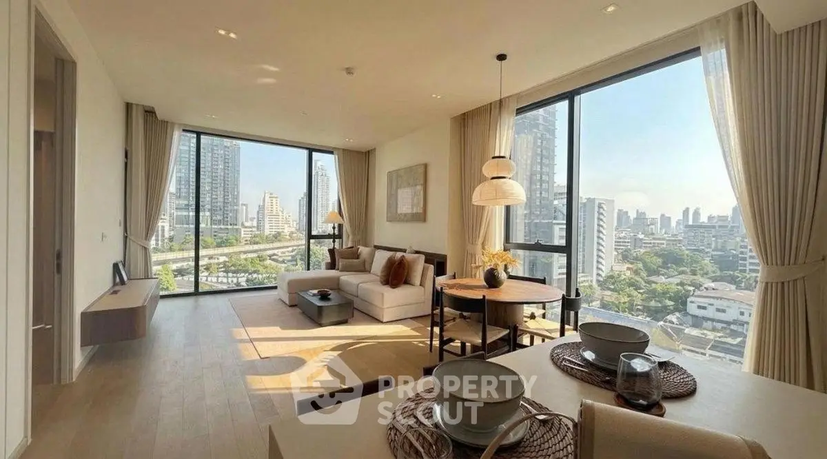 Spacious modern living room with panoramic city views and elegant decor