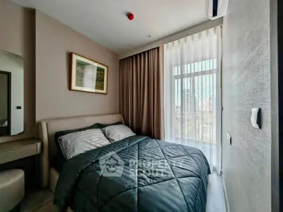 Cozy bedroom with modern decor and city view, featuring a comfortable bed and elegant curtains.