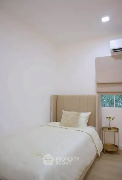 Cozy bedroom with elegant decor and natural light