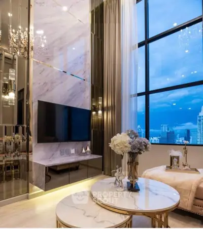 Luxurious living room with marble accents and stunning city view through large windows.