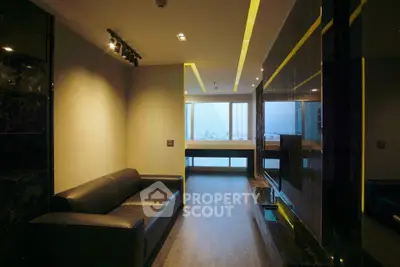 Luxurious modern living room with sleek black sofa and panoramic city view.