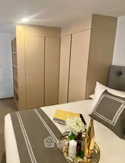 Elegant bedroom with modern decor and stylish storage solutions