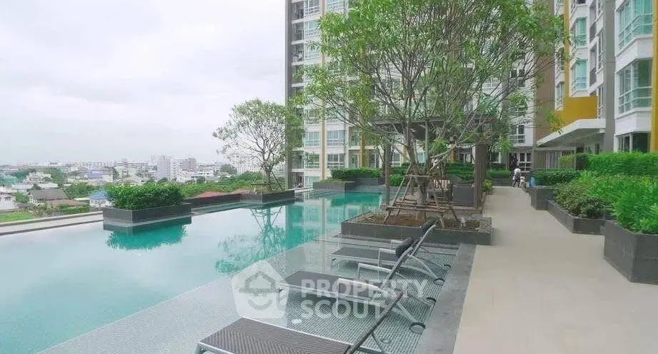 Luxurious rooftop pool with city view in modern high-rise building