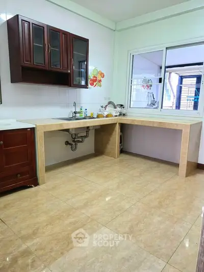 Spacious kitchen with open layout and modern cabinetry