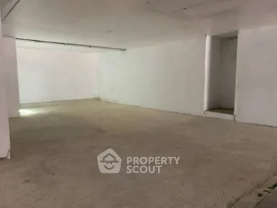Spacious unfinished basement with potential for customization in prime real estate location.