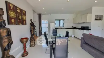 Spacious modern living room with elegant dining area and stylish decor