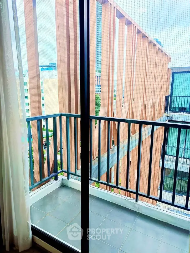Modern balcony with city view and sleek railing design